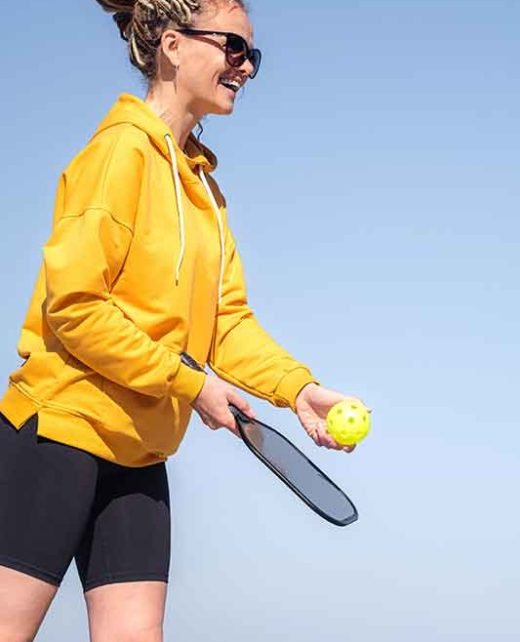 woman playing pickleball